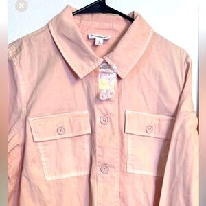 New light pink jacket.